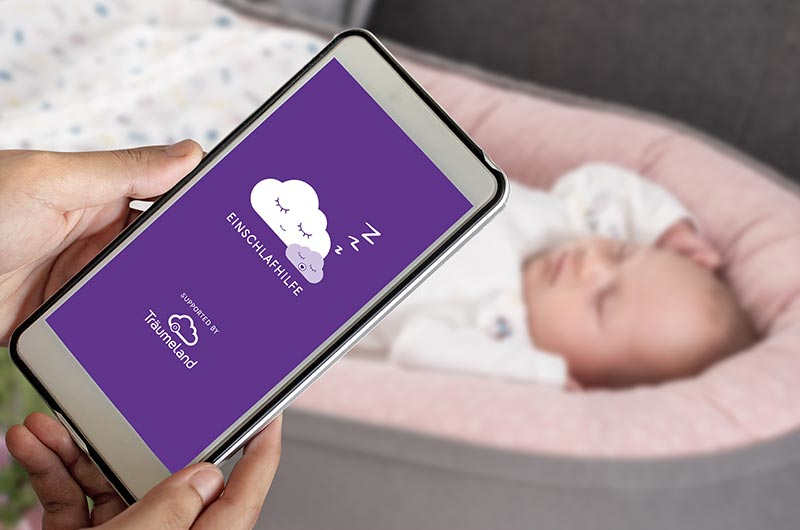 Baby im Nest HOME mit Träumeland Schlaf-App