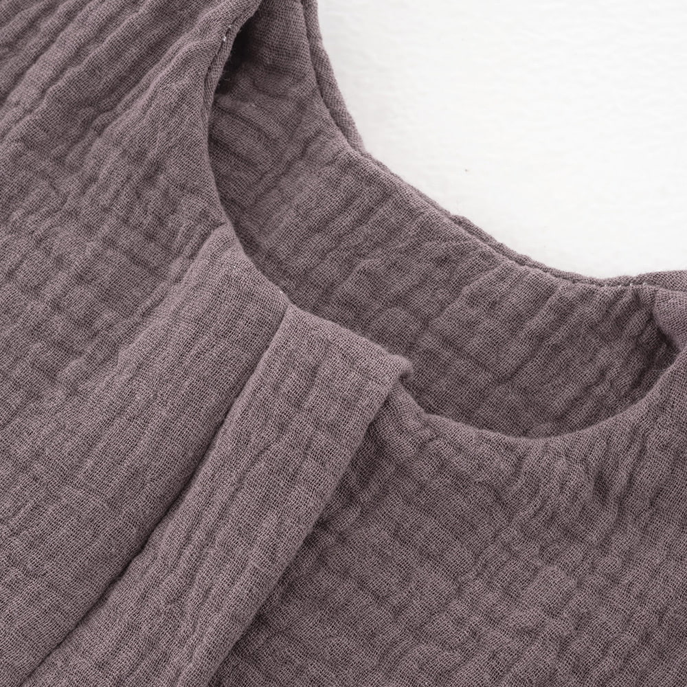 Musselin schokopflaume Detail Kinnschutz