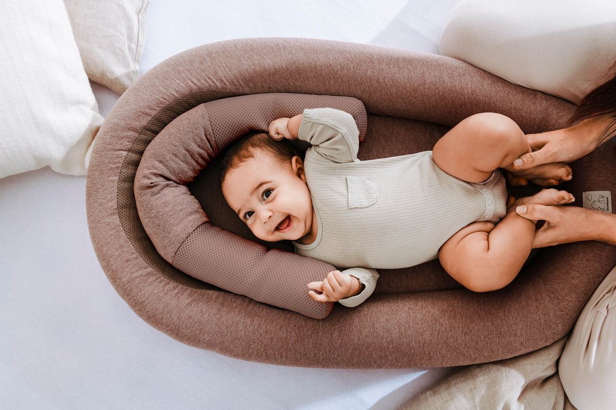 Baby im Babynest HOME Air Baby im Babynest HOME Air